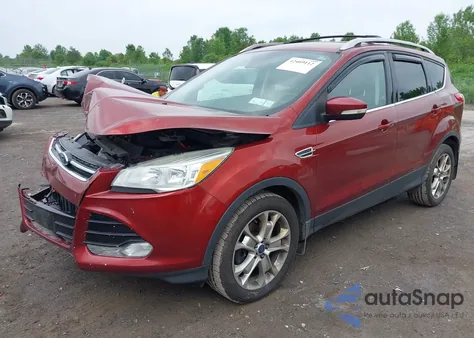 2015 Ford Escape Titanium z USA, uszkodzony, nr VIN 1FMCU9J98FUC84963